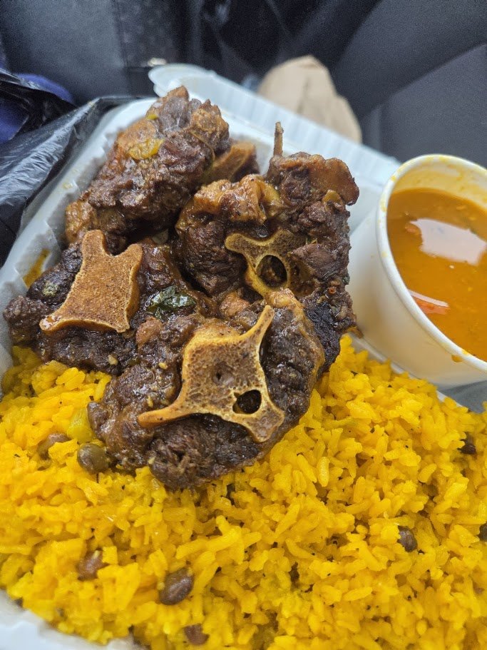 Colorful Dominican dishes on a restaurant table